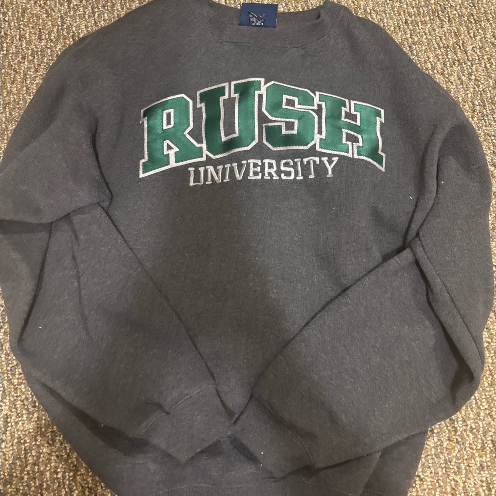 J. America Charcoal Crewneck Sweatshirt with Green & White Rush University Logo